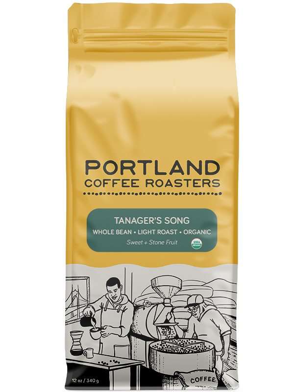A package of Portland Coffee Roasters' Organic Tanager's Song coffee, featuring a graphic of a person roasting coffee beans. green label reads whole bean, light roast, organic, sweet, and stone fruit