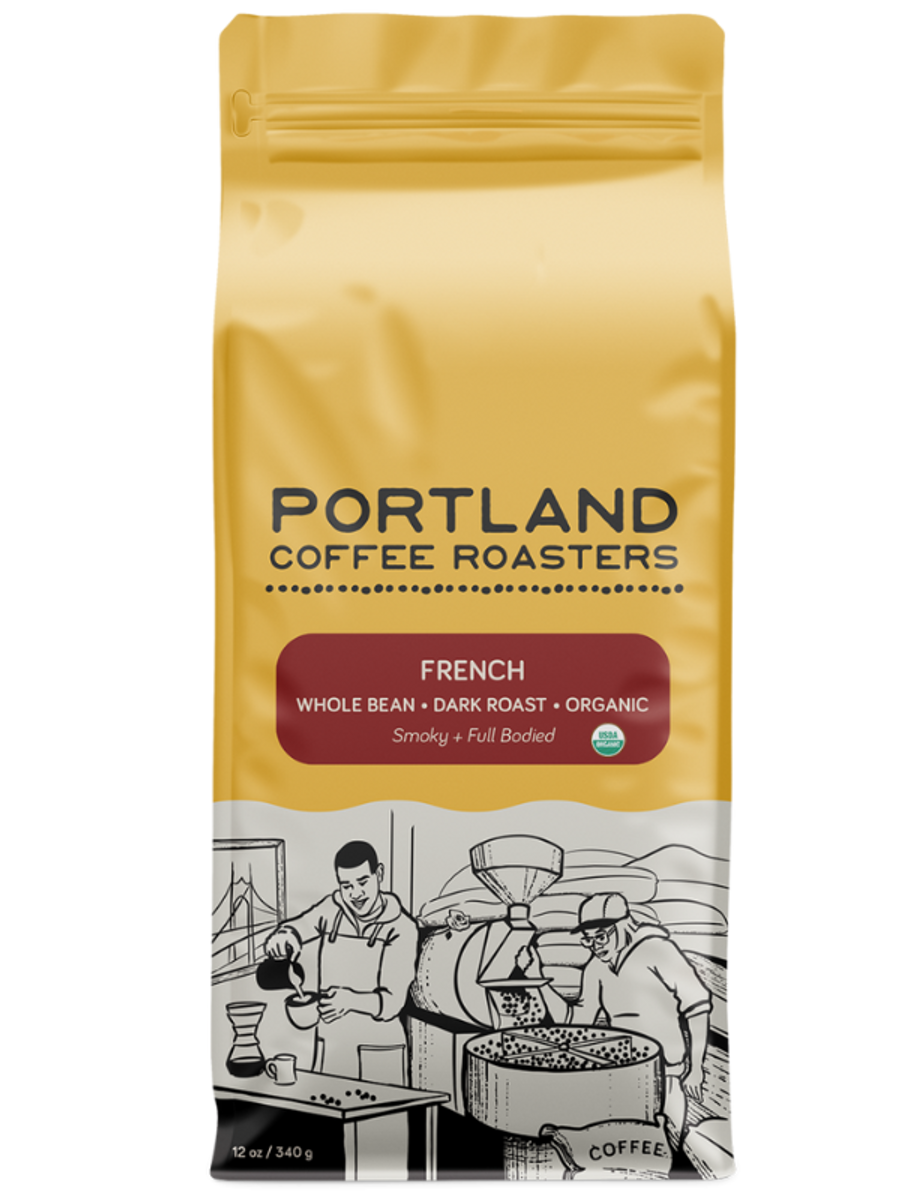 Coffee bag from Portland Coffee Roasters with a yellow background and black text. Red label reads french, whole bean, dark roast, organic, smoky and full bodied