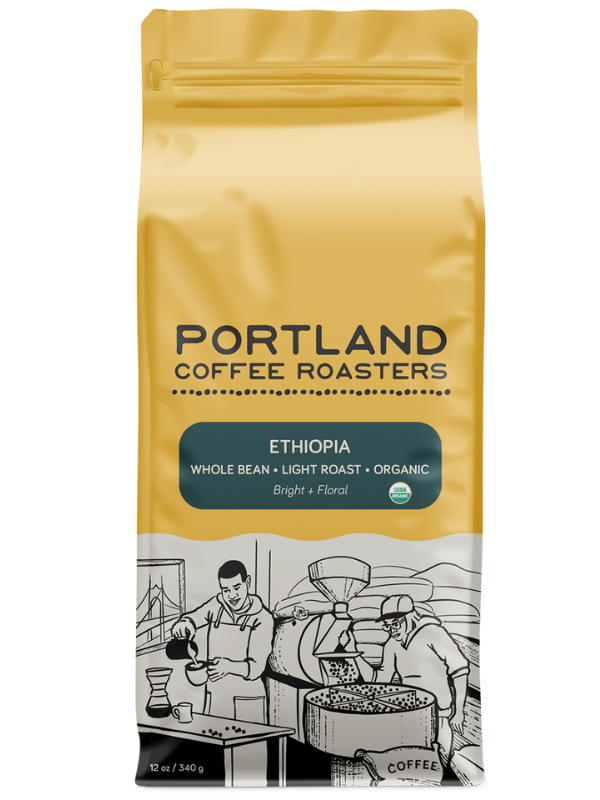 Coffee bag from Portland Coffee Roasters with a yellow background and black text. green label reads ethiopia, whole bean, light roast, organic, bright and floral