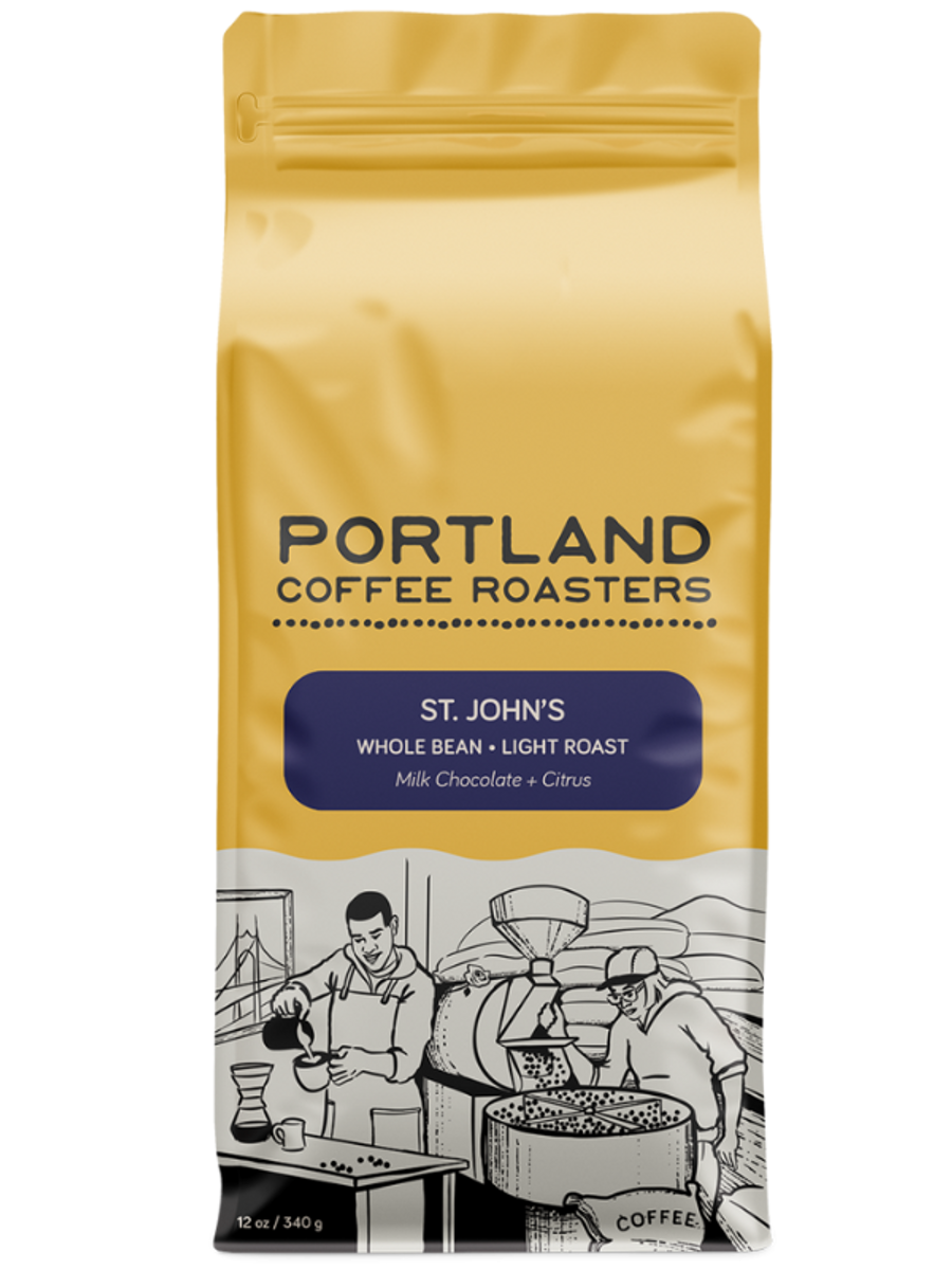 Coffee bag from Portland Coffee Roasters with a yellow background and black text. blue label reads st. johns whole bean light roast, milk chocolate + citrus 