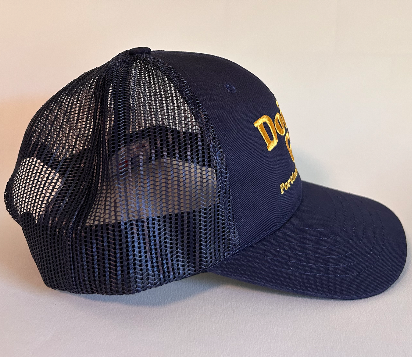 Navy Doing Good Trucker Hat